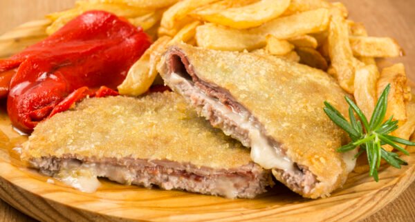 Traditional carhop, from Asturias Cachopo de Ternera Clasico (Jamon Serrano y Queso manchego curado)